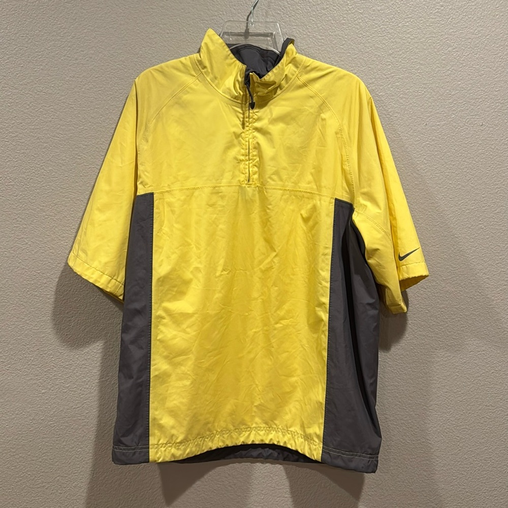 Storm fit Nike Golf yellow and grey short sleeve wind breaker jacket. Size M